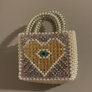 Beaded eye heart purse